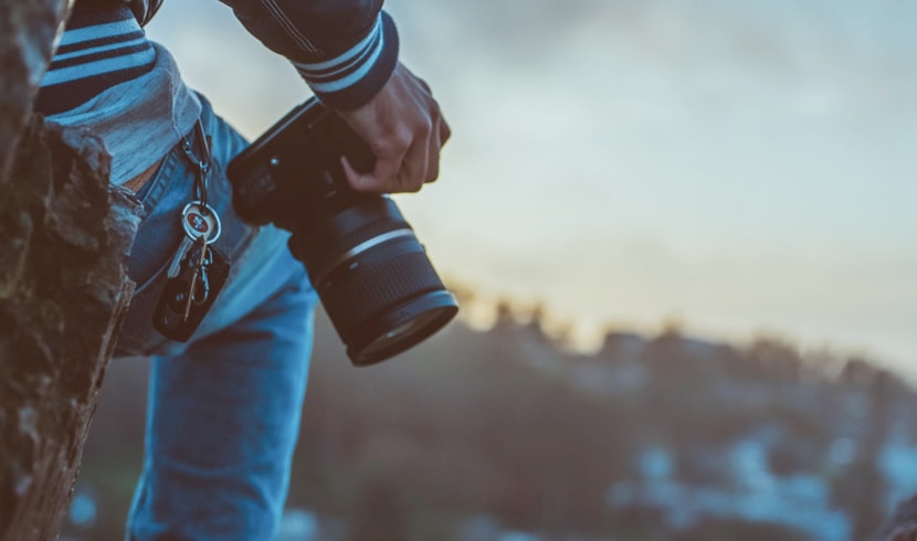 Photographer overlooking a lake