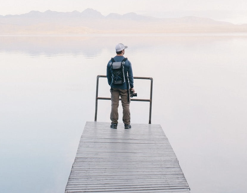 Photographer overlooking a lake