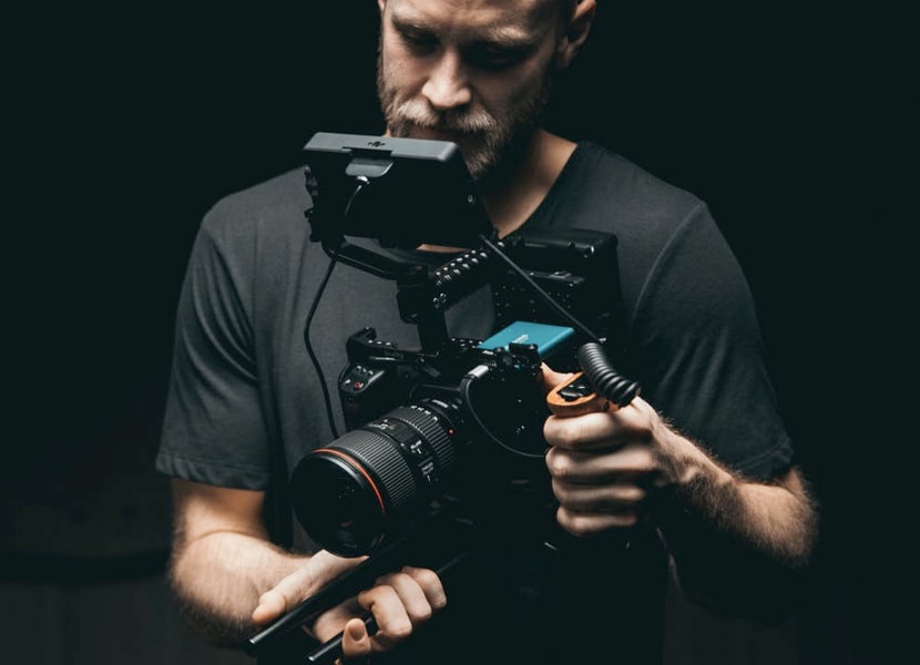 Photographer overlooking a lake